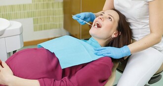 Болит зуб при беременности